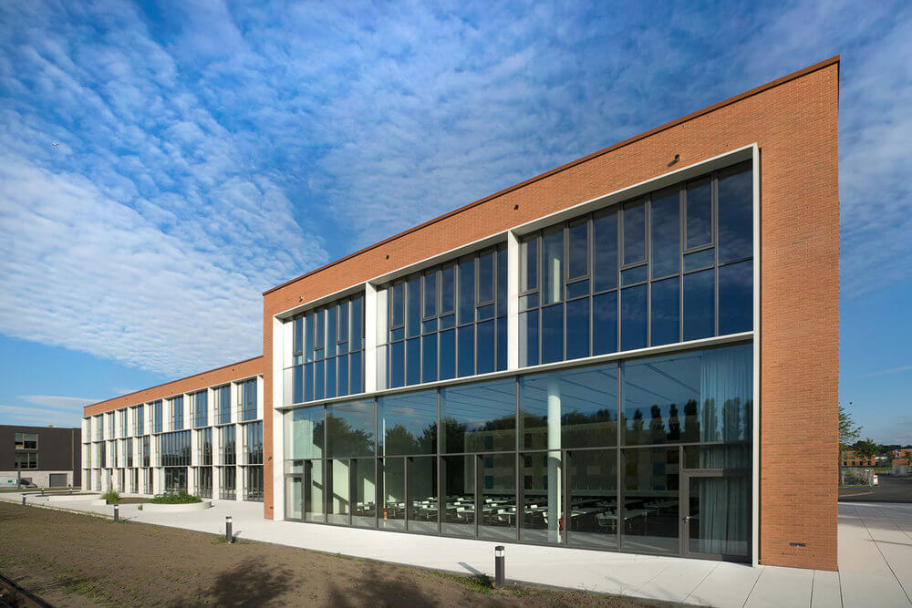 © ADMINISTRATIVE BUILDING TEXTILVERBAND MÜNSTER / behet bondzio lin architects GmbH & Co